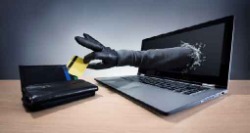 glove stealing credit card through computer screen